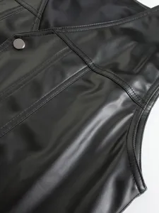 Men PU leather vest detail view, V-neck waistcoat texture, stylish urban biker apparel close up.
