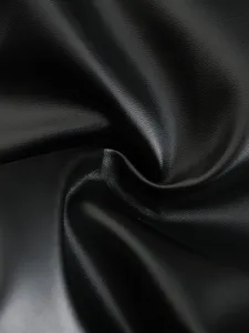 Black PU leather fabric material texture close up detail view, smooth and premium finish.
