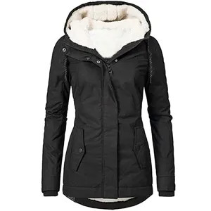 Detail of women's black hooded parka showing the soft white fleece lining
