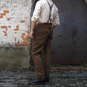 Men casual trousers vintage retro style brown trousers detailed look outdoor view