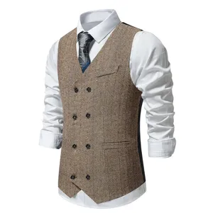 Men's vintage herringbone double-breasted suit vest detail showcasing tailored slim fit design.