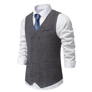 Close-up detail of mens grey herringbone double breasted suit vest with classic texture.