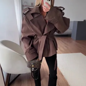 Women fall trench coat stylish belted long sleeve casual outerwear for daily commute.