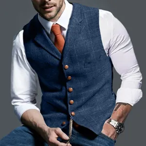 Elegant men's blue plaid slim-fit waistcoat paired with a white shirt and orange tie.