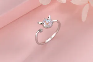 Detailed macro view of silver little devil ring featuring moonstone gem and cute horns