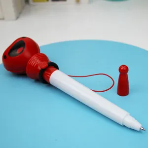 Creative stress relief ballpoint pen with cute red boxing design and durable white barrel.