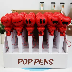Creative cute heart shaped decompression ballpoint pen with funny expression and hanging wrist rope.