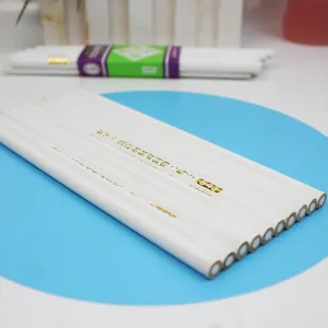 Detailed macro view of professional white highlighting pencils for sketching and art