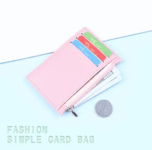 Ultra-slim pink leather card holder with zipper pocket and multiple card slots