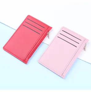 Two ultra-thin faux leather card holders with multiple slots and side zipper pouch