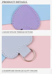 Detail der soliden Nylongarnnaht und des Metallrings am Herz-Leder-Schlüsselanhänger