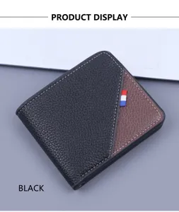 Vista detallada de una elegante cartera de hombre en cuero negro con panel de contraste marrón