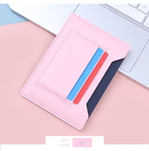 Detailed 45-degree view of ultra-thin soft pink leather passport holder and card wallet