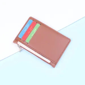 Minimalist ultra-thin brown leather card holder wallet with 5 slots and zipper pocket.