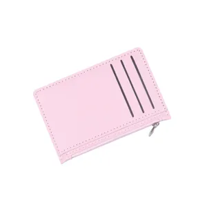Ultra-slim pink PU leather card holder with three card slots and side zipper closure.