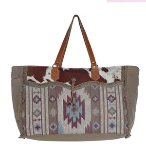 Vintage Bohemian canvas tote bag with Aztec patterns and cowhide print detail