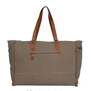 Retro bohemian large khaki canvas tote bag with brown leather handles and fringe details