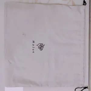 Front view of an off-white polyester drawstring dust bag with MaJue logo print