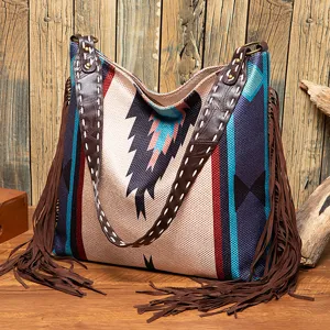 Bohemian vintage shoulder bag with ethnic patterns and long brown fringes