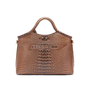 Vista detallada de bolso retro marrón para mujer con textura de cocodrilo