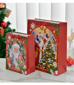 Festive red Christmas gift bags with vintage Santa Claus illustrations for holiday decor
