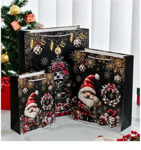 Set aus drei schwarzen Weihnachtsgeschenktüten mit Zwergen und Goldfolienmotiven.