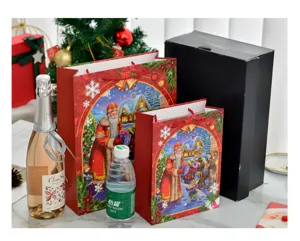 Detailed view of Christmas gift bags featuring festive and colorful Santa Claus illustrations