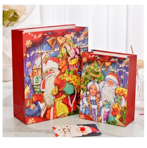 Sacchetti regalo di Natale festivi in due dimensioni con vivaci disegni di Babbo Natale
