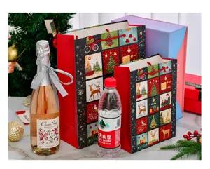 Christmas themed gift bags in large and small sizes shown with size reference props