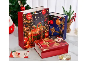 Set of festive red and blue Christmas paper gift bags with holiday holiday prints