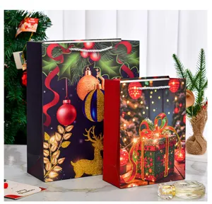 Set of two festive Christmas gift paper bags with reindeer and gift box designs in a cozy room