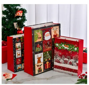 Assorted festive Christmas gift bags featuring cartoon Santa and reindeer with glitter.