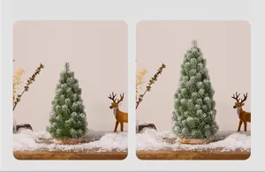 Close-up of two different sized snow-flocked PE desktop Christmas trees for holiday decor