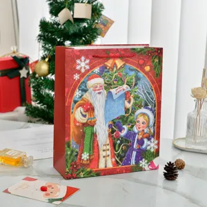 Large red Christmas gift bag featuring cartoon Santa Claus with sturdy rope handles