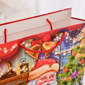 Grande sacchetto regalo di Natale in carta con Babbo Natale e manici in corda