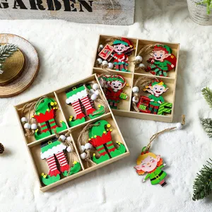 Set de adornos navideños de madera con duendes en cajas de cuatro compartimentos