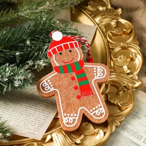 Festive handmade felt Christmas gingerbread man ornament for holiday tree decoration