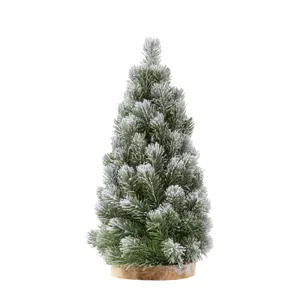 Artificial mini Christmas tree with realistic snow-flocked PE needles on a wooden base