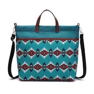 Front view of Bohemian Aztec patterned waterproof laptop tote bag with brown handles