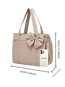 Tabella taglie dettagliata per borsa a tracolla beige con fiocco dimensioni 33x35x14cm