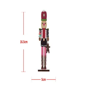 Detailed dimensions of wooden nutcracker soldier holding a cupcake and gingerbread man.