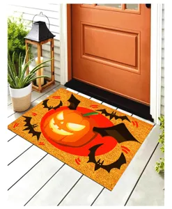 Detail view of Halloween pumpkin door mat at a house entrance with festive decorations