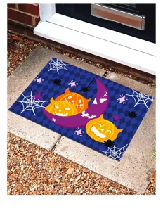 Decorative Halloween door mat with cartoon pumpkin design placed at house entrance