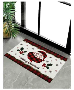 Detailed view of a Christmas doormat with Santa Claus print on a marble floor