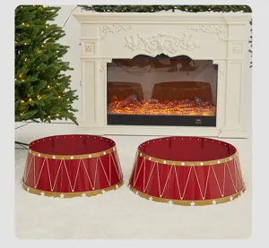 Red and gold circus style Christmas tree collars in a cozy fireplace setting.