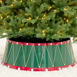 Festive red and green Christmas tree collar with white stars and gold rope details.