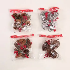 Set of assorted natural pine cones and red berries for festive Christmas tree decoration