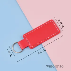 Roter PU-Leder Schlüsselanhänger rechteckig mit weißer Naht und silbernem Ring