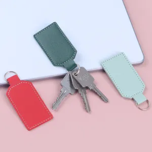 Hochwertige minimalistische PU-Leder-Schlüsselanhänger in Rot, Grün und Blau