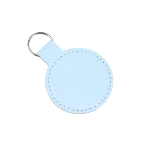 Porte-clés rond en cuir bleu clair minimaliste avec anneau en argent pour cadeau